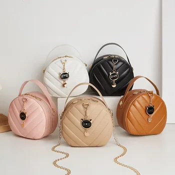 Нова мода ежедневна V-образна релефна котешка висулка с диагонален кръст малка кръгла чанта и чанта за рамо дизайнерски чанти